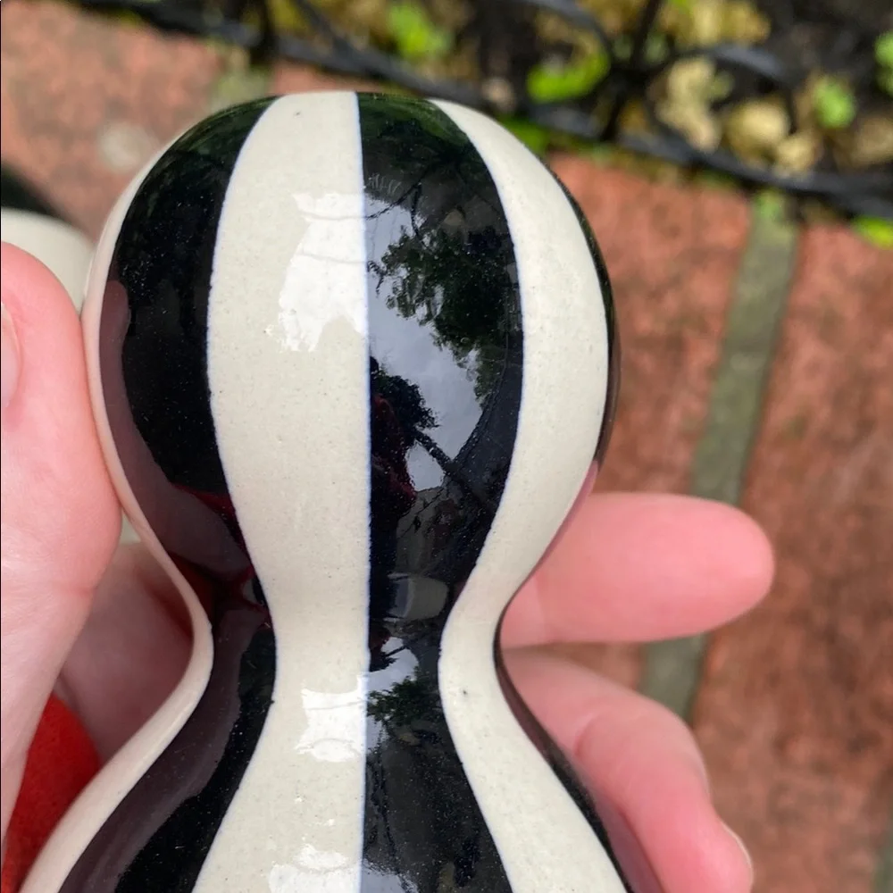 Set of three Jonathan Adler Black and White Striped Vases. Circa 1990s.